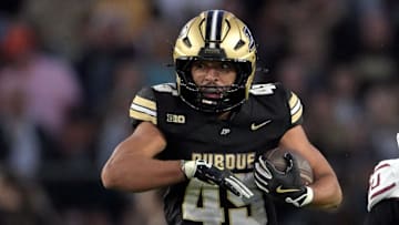 Purdue Boilermakers running back Devin Mockobee (45) runs 