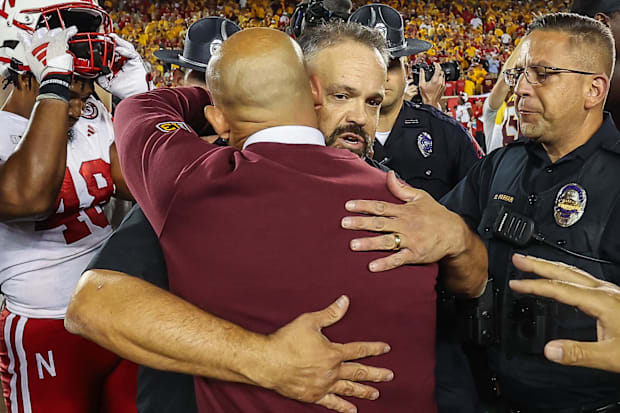 Minnesota Golden Gophers head coach P.J. Fleck and Nebraska Cornhuskers head coach Matt Rhule