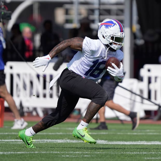 Elijah Moore runs up field