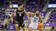 Noah Reynolds drive the ball for TCU men's basketball vs. Colorado on Sunday, February 5, 2025.