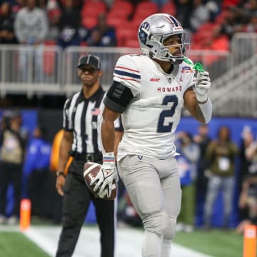 Dec 16, 2023; Atlanta, GA, USA; Howard Bison running back Jarett Hunter (2) reacts after a touchdown against the Florida A&M Rattlers in the first half at Mercedes-Benz Stadium. Mandatory Credit: Brett Davis-USA TODAY Sports
