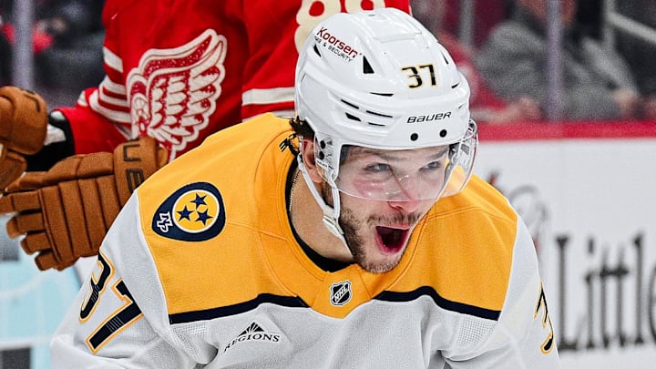 Nov 26, 2025; Detroit, Michigan, USA; Nashville Predators defenseman Nick Blankenburg (37) celebrates his goal as Detroit Red Wings right wing Patrick Kane (88) looks on during the third period at Little Caesars Arena. Mandatory Credit: Tim Fuller-Imagn Images