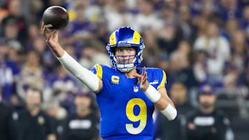Jan 13, 2025; Glendale, AZ, USA; Los Angeles Rams quarterback Matthew Stafford (9) against the Minnesota Vikings during an NFC wild card game at State Farm Stadium. Mandatory Credit: Mark J. Rebilas-Imagn Images