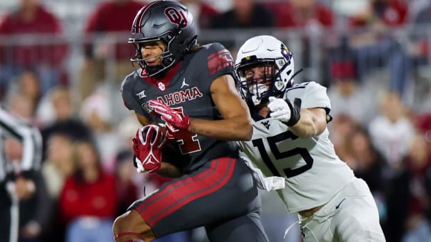 Ben Cutter (15) makes a tackle. Kevin Jairaj-USA TODAY Sports