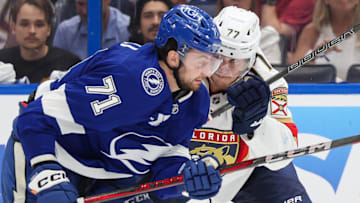 Apr 24, 2025; Tampa, Florida, USA; Florida Panthers defenseman Niko Mikkola (77) blocks Tampa Bay Lightning center Anthony Cirelli (71) during the third period in game two of the first round of the 2025 Stanley Cup Playoffs at Amalie Arena. Mandatory Credit: Nathan Ray Seebeck-Imagn Images