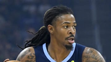 Memphis Grizzlies guard Ja Morant dribbles the ball in the first quarter against the Cleveland Cavaliers.