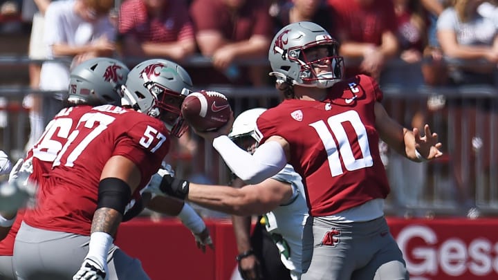 Aug 31, 2024; Pullman, Washington, USA; Washington State Cougars quarterback John Mateer (10) throws a pass against the Portland State Vikings in the first half at Gesa Field at Martin Stadium. Mandatory Credit: James Snook-USA TODAY Sports