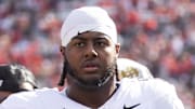 Oct 19, 2024; Tucson, Arizona, USA; Colorado Buffalos offensive tackle Jordan Seaton (77) against the Arizona Wildcats at Arizona Stadium. 