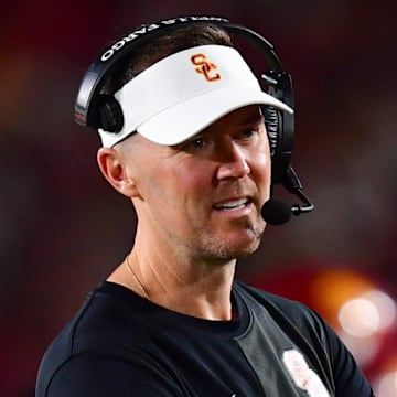 Sep 20, 2025; Los Angeles, California, USA; Southern California Trojans head coach Lincoln Riley speaks with the official during the second half at the Los Angeles Memorial Coliseum. Mandatory Credit: Gary A. Vasquez-Imagn Images