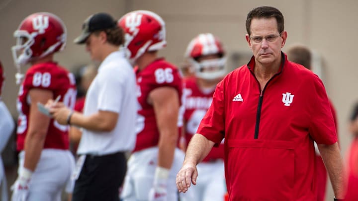 Indiana coach Curt Cignetti walks among the players before Indiana's game against Florida International at Memorial Stadium.