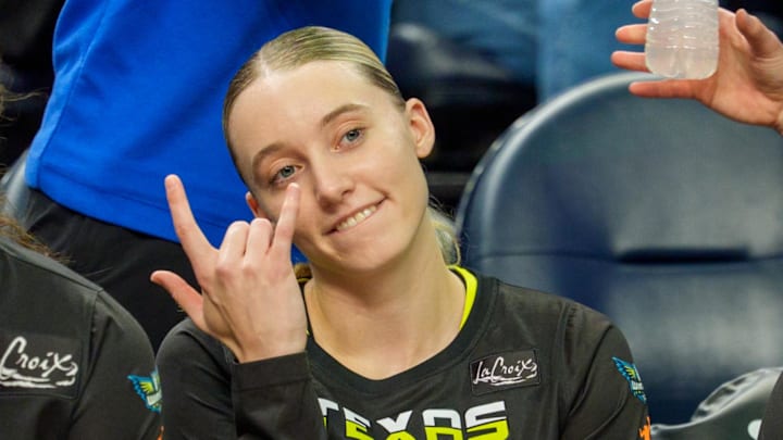 Sep 1, 2025; Minneapolis, Minnesota, USA; Dallas Wings guard Paige Bueckers (5) gestures while awaiting introductions before the game against the Minnesota Lynx at Target Center. Mandatory Credit: Matt Blewett-Imagn Images
