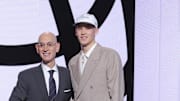 Jun 25, 2025; Brooklyn, NY, USA;  Egor Demin stands with NBA commissioner Adam Silver after being selected as the eighth pick by the Brooklyn Nets in the first round of the 2025 NBA Draft at Barclays Center. Mandatory Credit: Brad Penner-Imagn Images