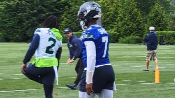 Geno Smith warms up for the Seahawks first open OTA practice of the 2024 offseason.