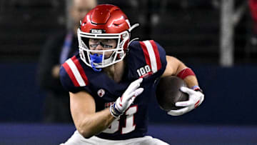 Jan 30, 2025; Arlington, TX, USA; East wide receiver Efton Chism of Eastern Washington (81) runs with the ball during the first half against the West at AT&T Stadium. Mandatory Credit: Jerome Miron-Imagn Images