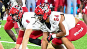 Sep 11, 2025; Winston-Salem, North Carolina, USA;  North Carolina State Wolfpack defensive end Sabastian Harsh (54) lines up against Wake Forest Demon Deacons at Allegacy Federal Credit Union Stadium. Mandatory Credit: Luke Jamroz-Imagn Images