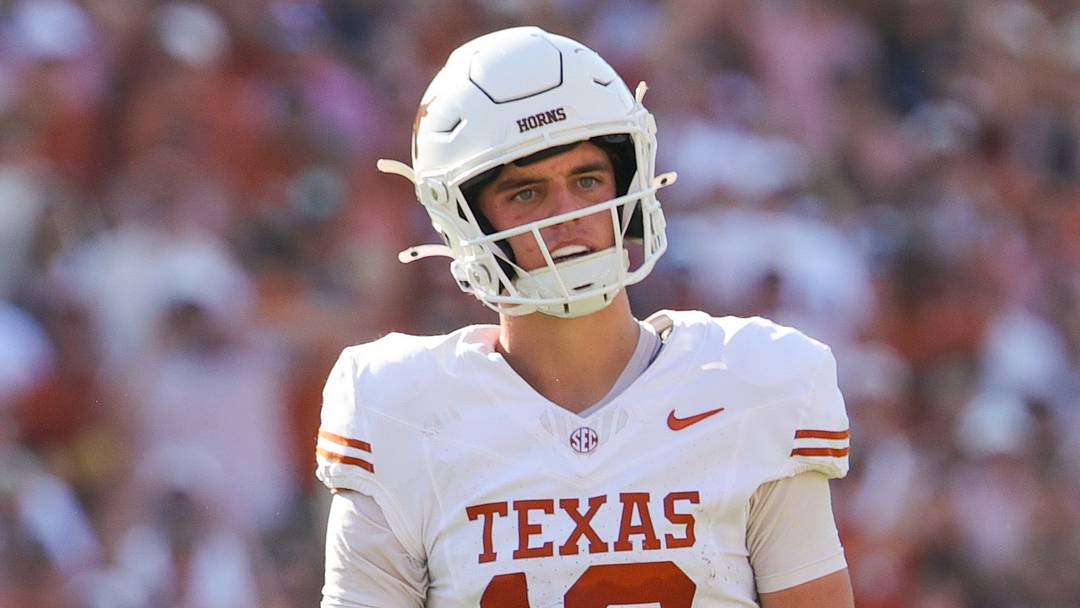 Texas Longhorns quarterback Arch Manning (16) reacts during the game against the Oklahoma Sooners at the Cotton Bowl.