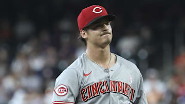 Cincinnati Reds starting pitcher Chase Petty (61) reacts
