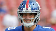 Former New York Giants quarterback Eli Manning smiles prior to a game in Tampa Bay on Oct 1, 2017.