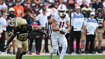 Sep 20, 2025; Blacksburg, Va.; Virginia Tech wide receiver Tucker Holloway (11) runs after a catch.