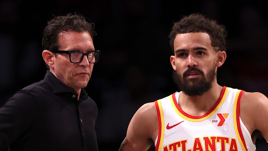 Atlanta Hawks head coach Quin Snyder and Trae Young #11 talk against the Brooklyn Nets.
