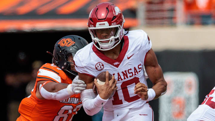 Arkansas Razorbacks quarterback Taylen Green (10) runs the ball during the first quarter against the Oklahoma State Cowboys at Boone Pickens Stadium.