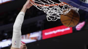 Jan 13, 2023; Detroit, Michigan, USA;  New Orleans Pelicans center Jonas Valanciunas (17) dunks in