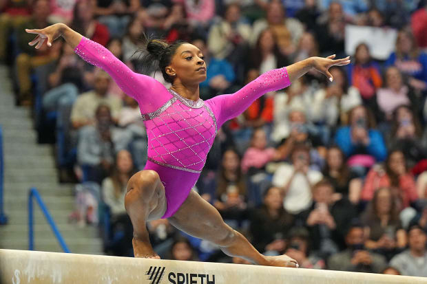 U.S. gymnast Simone Biles poses on the balance beam. 