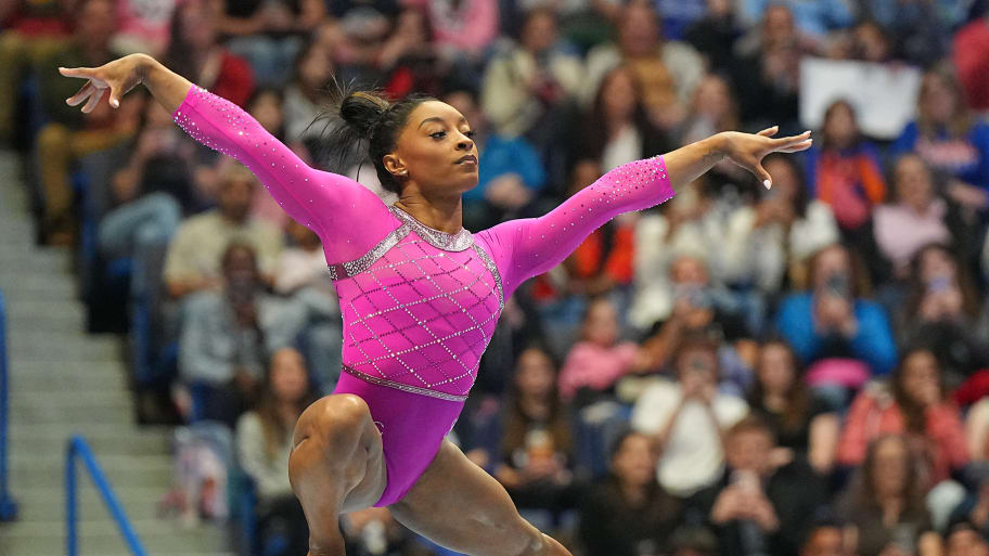 U.S. gymnast Simone Biles poses on the balance beam. 