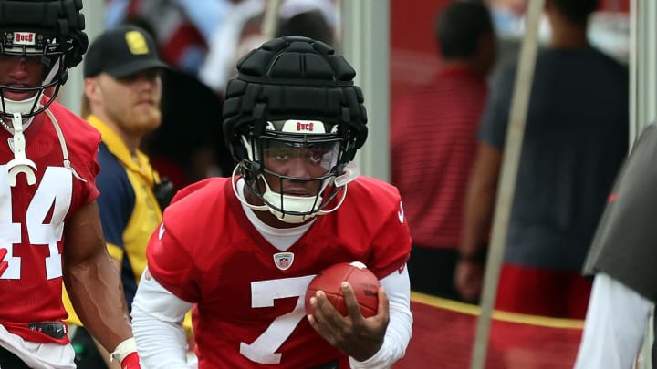 Jul 25, 2024; Tampa, FL, USA;  Tampa Bay Buccaneers running back Bucky Irving (7) works out during training camp at AdventHealth Training Center. Mandatory Credit: Kim Klement Neitzel-USA TODAY Sports