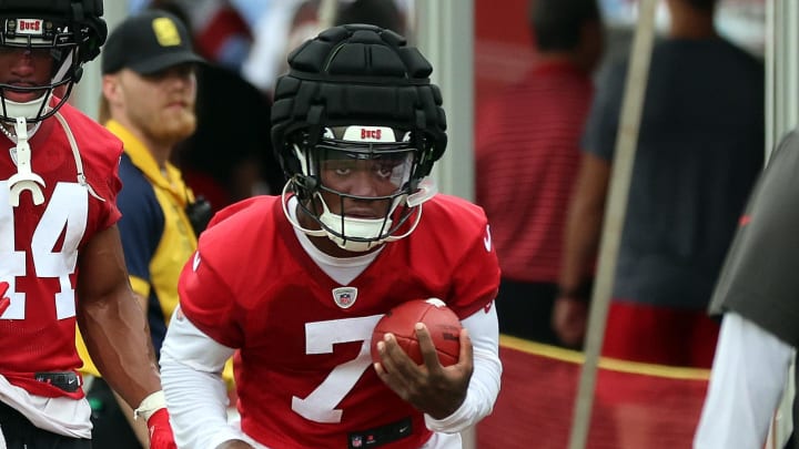 Jul 25, 2024; Tampa, FL, USA;  Tampa Bay Buccaneers running back Bucky Irving (7) works out during training camp at AdventHealth Training Center. Mandatory Credit: Kim Klement Neitzel-USA TODAY Sports