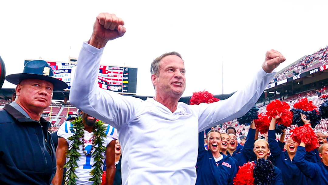Ole Miss Rebels head coach Lane Kiffin celebrates with fans after the game against the Oklahoma Sooners at Gaylord Family-Oklahoma Memorial Stadium. Credit: Kevin Jairaj-Imagn Images