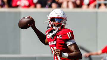 Oct 4, 2025; Raleigh, North Carolina, USA; NC State Wolfpack quarterback CJ Bailey (11) prepares to throw the ball during the first half of the game against Campbell Fighting Camels at Carter-Finley Stadium. Mandatory Credit: Jaylynn Nash-Imagn Images