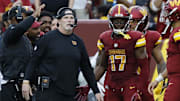 Sep 21, 2025; Landover, Maryland, USA; Washington Commanders head coach Dan Quinn (L) stands with Commanders wide receiver Terry McLaurin (17) on the sidelines against the Las Vegas Raiders during the third quarter at Northwest Stadium. Mandatory Credit: Geoff Burke-Imagn Images