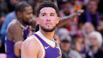 Nov 2, 2024; Phoenix, Arizona, USA;  Phoenix Suns guard Devin Booker (1) reacts after a time out in the second half during a game against the Portland Trail Blazers at Footprint Center. Mandatory Credit: Allan Henry-Imagn Images