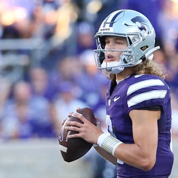 Aug 31, 2024; Manhattan, Kansas, USA; Kansas State Wildcats quarterback Avery Johnson (2) drops back to pass during the second quarter against the Tennessee-Martin Skyhawks at Bill Snyder Family Football Stadium. Mandatory Credit: Scott Sewell-Imagn Images