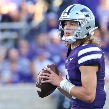 Aug 31, 2024; Manhattan, Kansas, USA; Kansas State Wildcats quarterback Avery Johnson (2) drops back to pass during the second quarter against the Tennessee-Martin Skyhawks at Bill Snyder Family Football Stadium. Mandatory Credit: Scott Sewell-Imagn Images