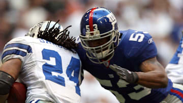 Reggie Torbor wore #53 with the New York Giants, but he was #82 with the Auburn Tigers. 