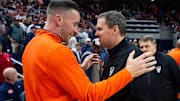 Auburn Tigers head coach Steven Pearl and NC State Wolfpack head coach Will Wade talk as the Auburn Tigers take on the NC State Wolfpack at Neville Arena in Auburn, Ala. on Wednesday, Dec. 3, 2025.