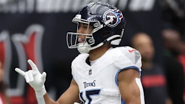 Nov 24, 2024; Houston, Texas, USA;  Tennessee Titans wide receiver Nick Westbrook-Ikhine (15) celebrates his touchdown reception against the Houston Texans in the first quarter at NRG Stadium. Mandatory Credit: Thomas Shea-Imagn Images