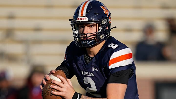 Jared Curtis visits with Bill Belichick during in-home visit season.