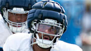 Tennessee Titans outside linebacker Dre'Mont Jones goes through drills during training camp.