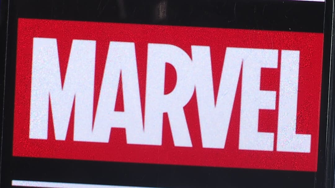 In this photo illustration, Marvel Entertainment logo seen...