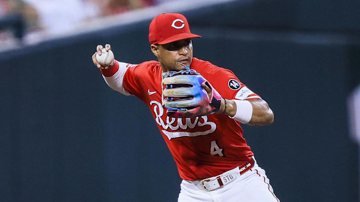 Cincinnati Reds third baseman Santiago Espinal (4) throws