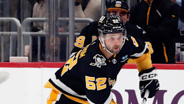 Mar 7, 2024; Pittsburgh, Pennsylvania, USA;  Pittsburgh Penguins right wing Emil Bemstrom (52) skates with the puck against the Washington Capitals during the first period at PPG Paints Arena. Mandatory Credit: Charles LeClaire-Imagn Images