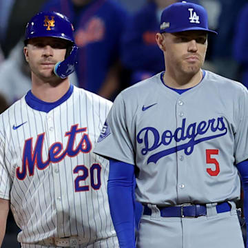 Oct 18, 2024; New York City, New York, USA; New York Mets first baseman Pete Alonso (20) takes a lead off first base against Los Angeles Dodgers first baseman Freddie Freeman (5) during the eighth inning of game five of the NLCS during the 2024 MLB playoffs at Citi Field. Mandatory Credit: Brad Penner-Imagn Images