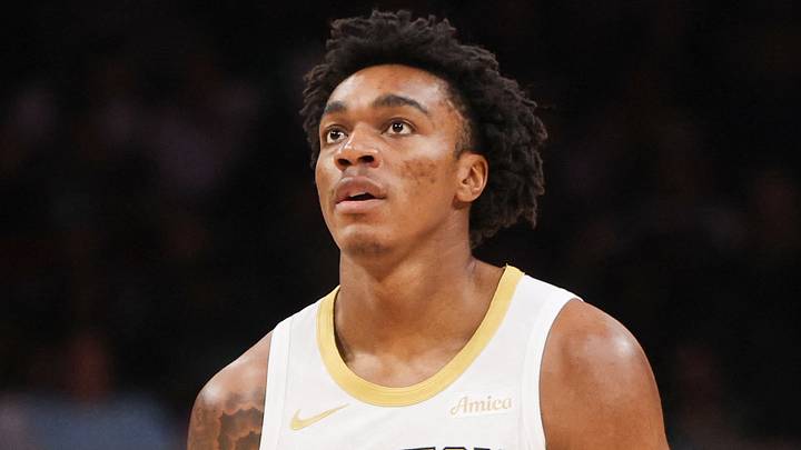 Jan 17, 2026; Atlanta, Georgia, USA; Boston Celtics forward Amari Williams (77) in action against the Atlanta Hawks in the fourth quarter at State Farm Arena. Mandatory Credit: Brett Davis-Imagn Images