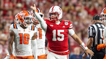 Nebraska quarterback Dylan Raiola signals a first down against Illinois last season.