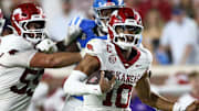 Arkansas Razorback quarterback Taylen Green (10) runs the ball during the fourth quarter against the Ole Miss Rebels at Vaught-Hemingway Stadium in Oxford, Miss.