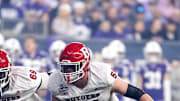 Dec 26, 2024; Phoenix, AZ, USA; Rutgers Scarlet Knights offensive lineman Gus Zilinskas (59) against the Kansas State Wildcats during the Rate Bowl at Chase Field. Mandatory Credit: Mark J. Rebilas-Imagn Images