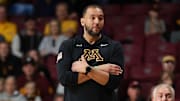 Nov 9, 2024; Minneapolis, Minnesota, USA; Minnesota Golden Gophers head coach Ben Johnson looks on during the second half against the Omaha Mavericks at Williams Arena. Mandatory Credit: Matt Krohn-Imagn Images